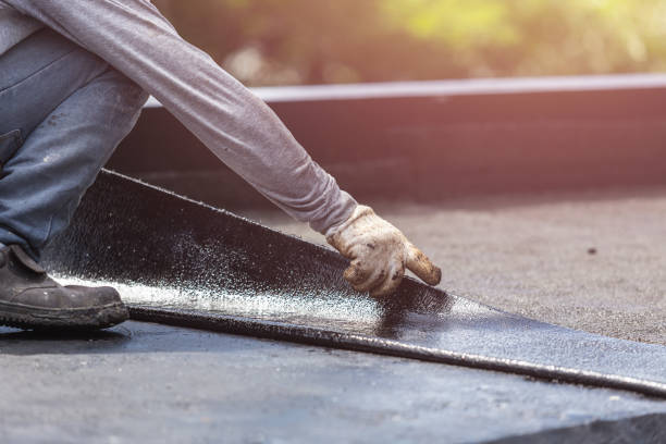 Professional Waterproofing technician working in Ontario, NY